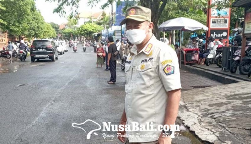 www.nusabali.com-kasatpol-pp-denpasar-purna-tugas-saat-tahun-baru