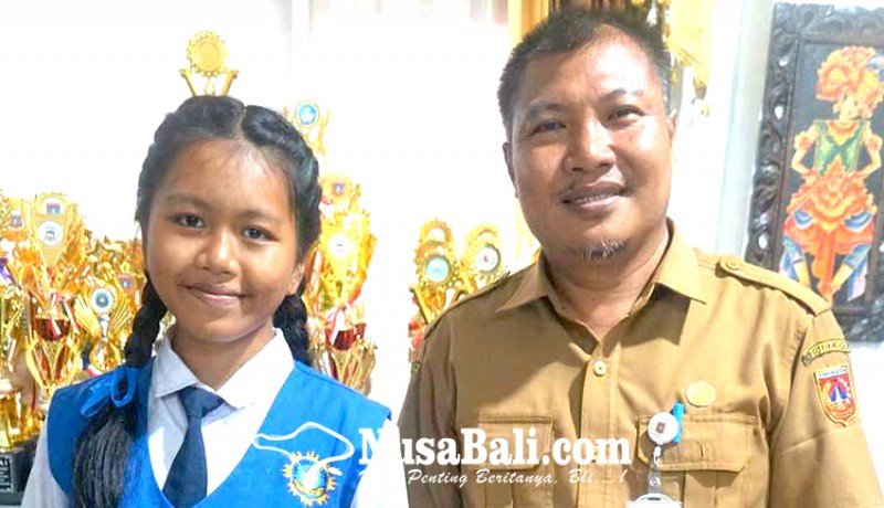 www.nusabali.com-putu-wima-ketua-osis-smpn-2-amlapura