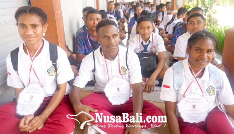 www.nusabali.com-smkn-1-amlapura-terima-3-siswa-papua