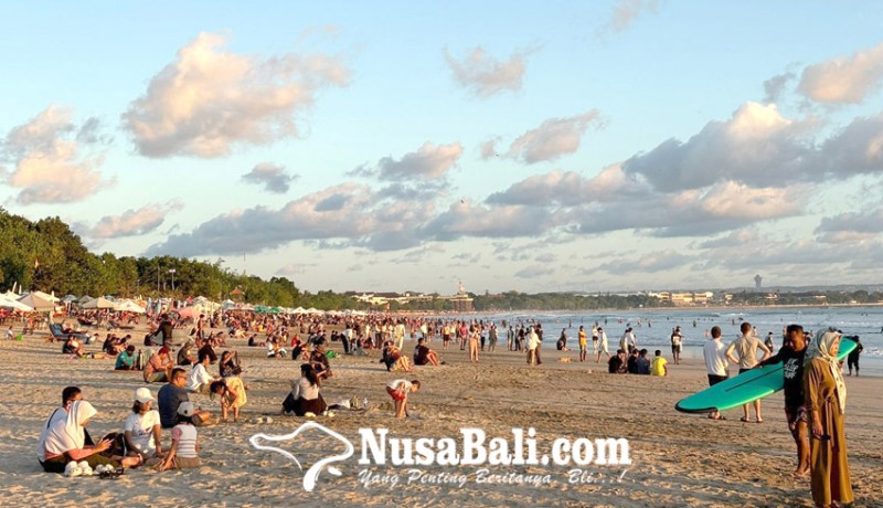 www.nusabali.com-wisman-mendominasi-kunjungan-ke-pantai-kuta