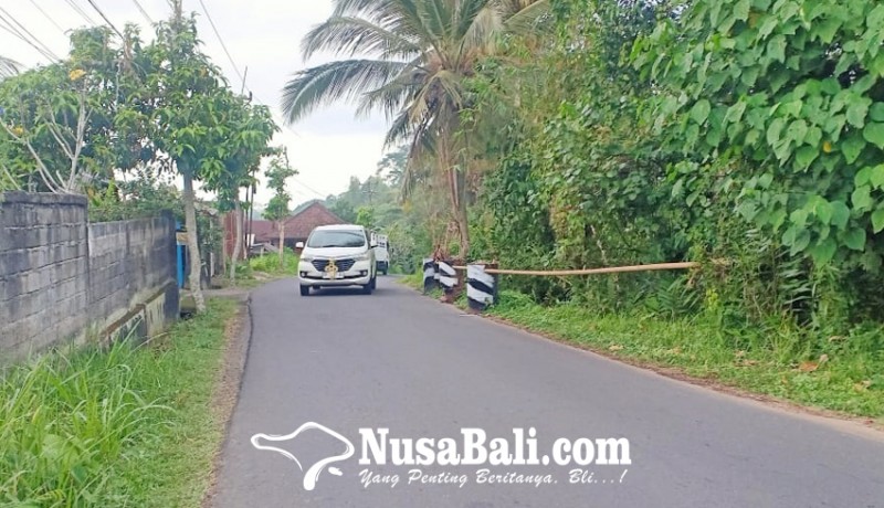 www.nusabali.com-perbaikan-jalan-ambrol-tunggu-anggaran