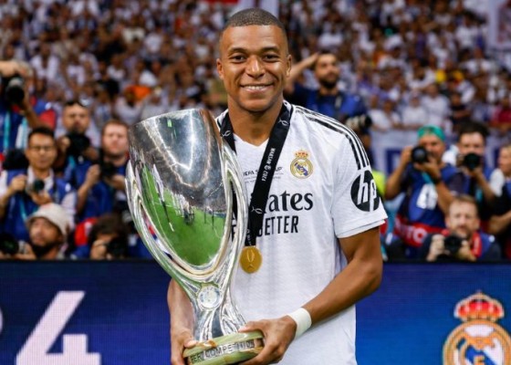 Nusabali.com - mbappe-cetak-gol-debut-real-madrid-raih-piala-super-eropa