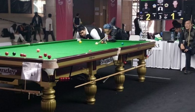 www.nusabali.com-putu-edi-wirawan-lolos-ke-perempat-final-snooker-pon-xxi