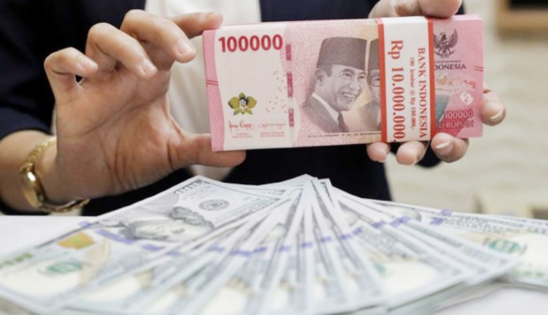 www.nusabali.com-rupiah-melemah-ke-rp-16235-per-dolar-as