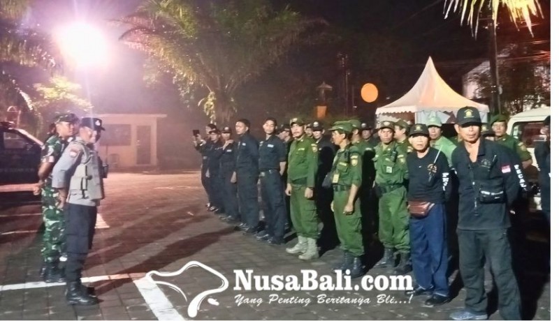 www.nusabali.com-pecalang-gumi-kebonkuri-kesiman-siaga-di-malam-pergantian-tahun-2025