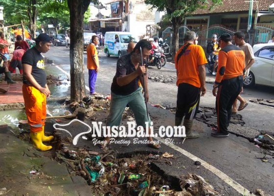 Nusabali.com - pasca-banjir-aspal-jalan-terkelupas