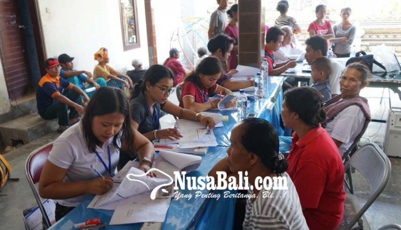 www.nusabali.com-warga-terima-bantuan-pangan-non-tunai