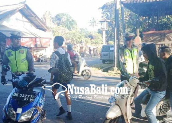 Nusabali.com - ops-zebra-tindak-pelajar-smp-pengendara-motor