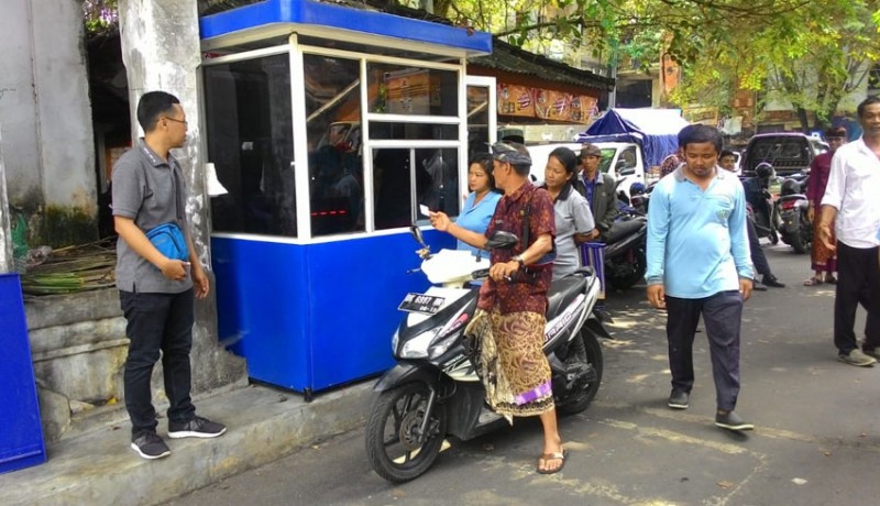 www.nusabali.com-minggu-parkir-otomatis-berlaku-di-pasar-transit-tabanan