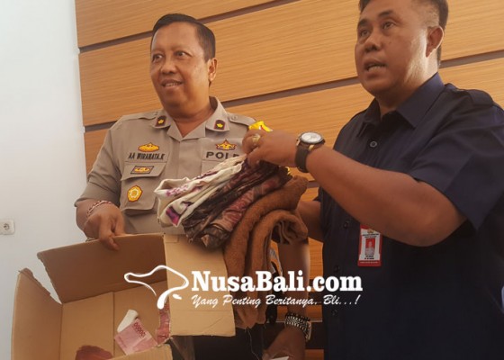 Nusabali.com - bayi-laki-laki-dibuang-di-depan-tpa