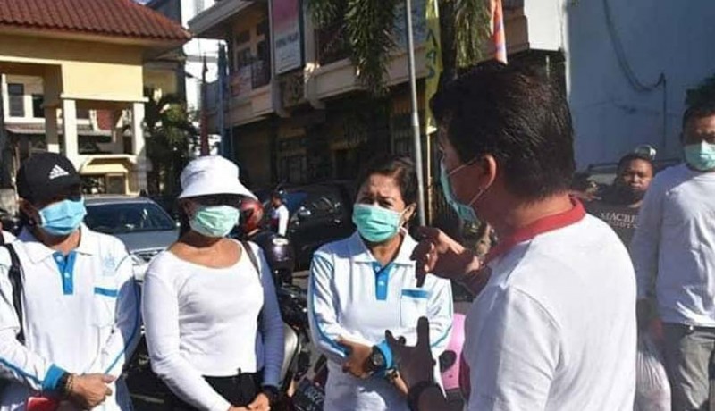 www.nusabali.com-bupati-suwirta-bagikan-1000-masker-di-pasar-galiran