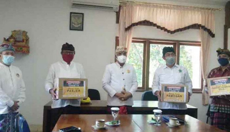 www.nusabali.com-ncpi-bali-serahkan-bantuan-masker-kepada-perwakilan-desa-adat