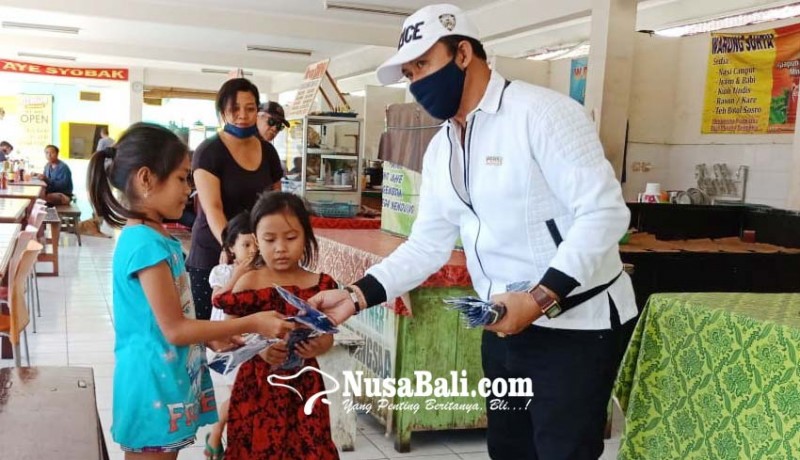 www.nusabali.com-pwi-bali-bagikan-seribu-masker-di-buleleng