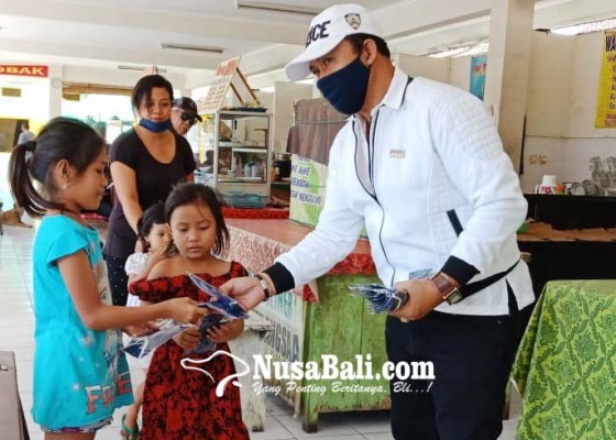 Nusabali.com - pwi-bali-bagikan-seribu-masker-di-buleleng