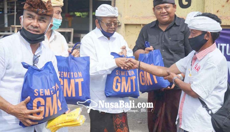 www.nusabali.com-gmt-bagikan-196-ton-beras-di-3-desa