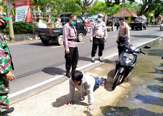 Nusabali.com - tabanan-tambah-7-kasus-tni-ikut-tegakkan-prokes