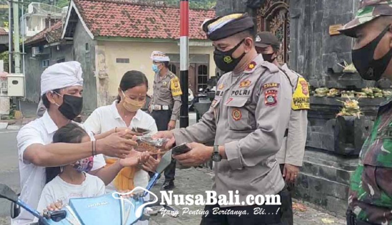 www.nusabali.com-polsek-padangbai-gebrak-masker