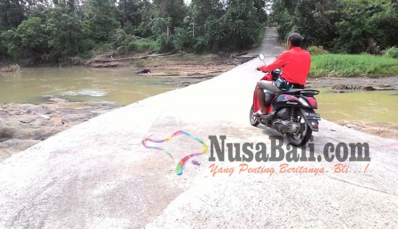 www.nusabali.com-jembatan-tibubiu-beraban-sudah-normal