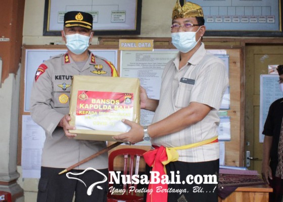 Nusabali.com - kapolda-bali-gelontorkan-99-paket-sembako