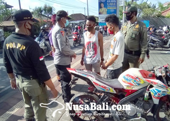 Nusabali.com - tim-yustisi-denpasar-jaring-24-pelanggar-prokes